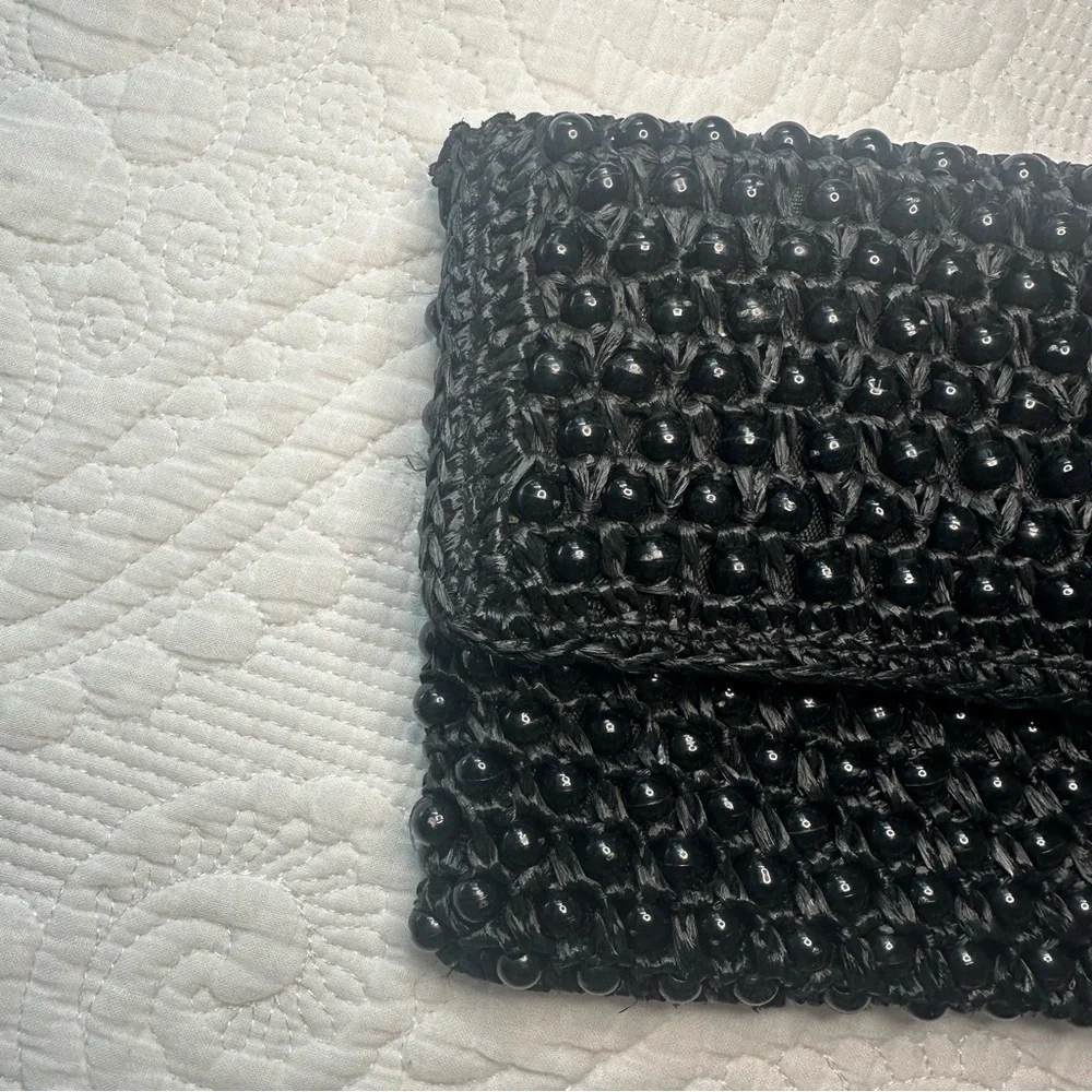 Made in Italy Ratan Beaded Black Clutch.